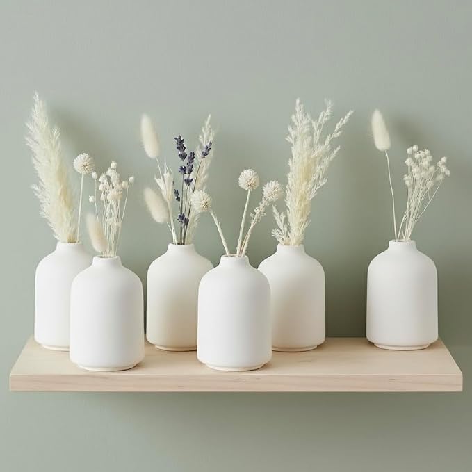 Carrot's Den Small White Ceramic Bud Vase Set of 6, Flower Centerpieces | Mini stoneware profile, sealed to hold water. Six matching pieces line up along a dining table, mantel, or open shelves.