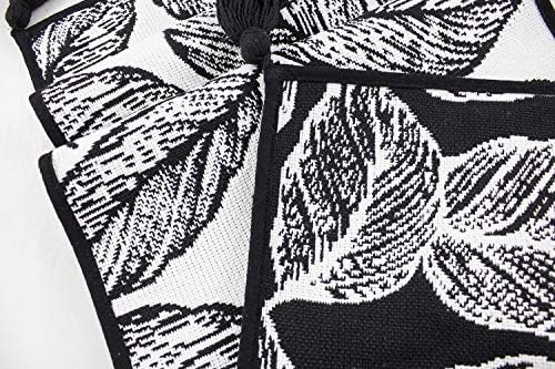Fennco Styles Black and White Leaf Woven Table Runner - 14 x 71 Inch Reversible Runner Table Centerpiece for Dining Home Decor, Indoor Parties, Holiday Events Tassel Table Runner