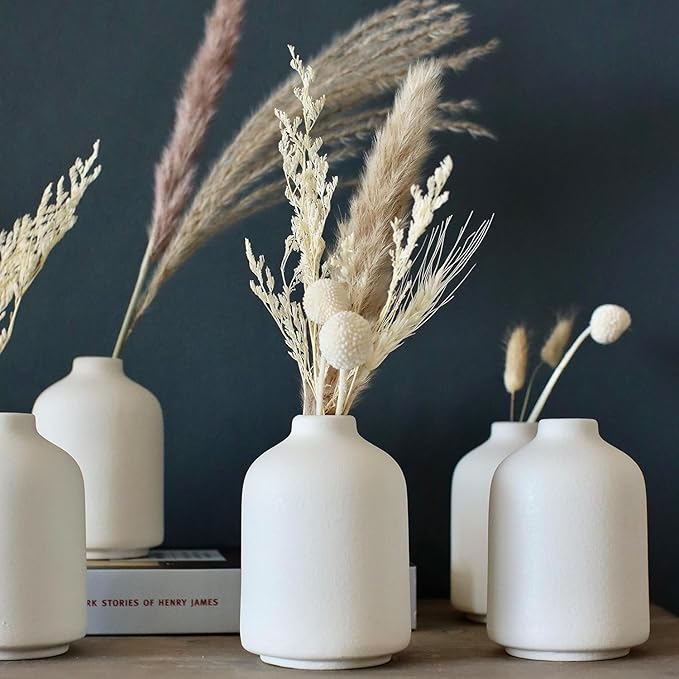 Carrot's Den Small White Ceramic Bud Vase Set of 6, Flower Centerpieces | Mini stoneware profile, sealed to hold water. Six matching pieces line up along a dining table, mantel, or open shelves.