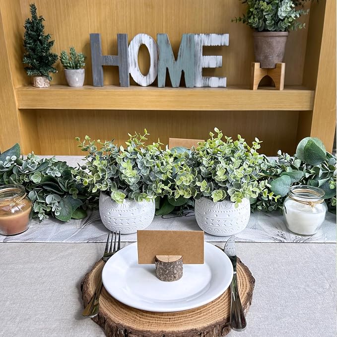 Winlyn Set of 2 Small Artificial Potted Plants Faux Eucalyptus Plant in White Geometric Ceramic Pots Small Desk Potted Plants 7.1" Tall for Home Office Room Decorations Wedding Greenery Centerpiece