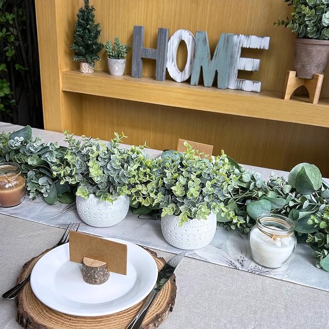 Winlyn Set of 2 Small Artificial Potted Plants Faux Eucalyptus Plant in White Geometric Ceramic Pots Small Desk Potted Plants 7.1" Tall for Home Office Room Decorations Wedding Greenery Centerpiece