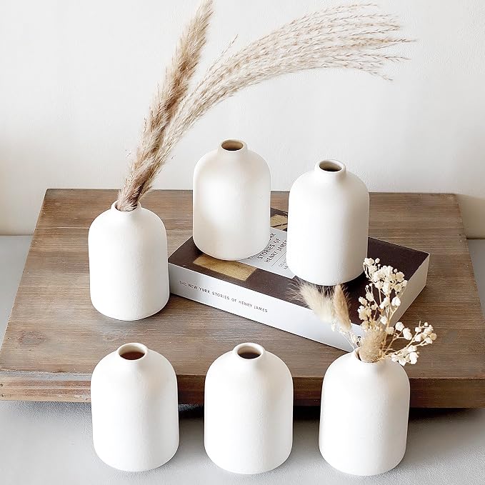 Carrot's Den Small White Ceramic Bud Vase Set of 6, Flower Centerpieces | Mini stoneware profile, sealed to hold water. Six matching pieces line up along a dining table, mantel, or open shelves.